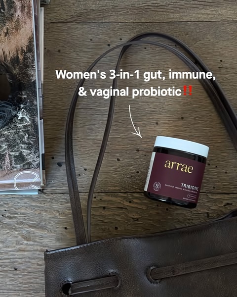 A clean, lifestyle-oriented ad featuring a probiotic jar against a neutral, high-end background with a direct 3-in-1 benefit headline.